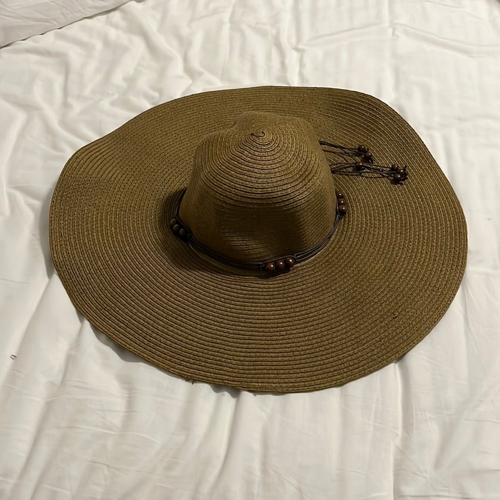 Brown hat, worn once. Practically new